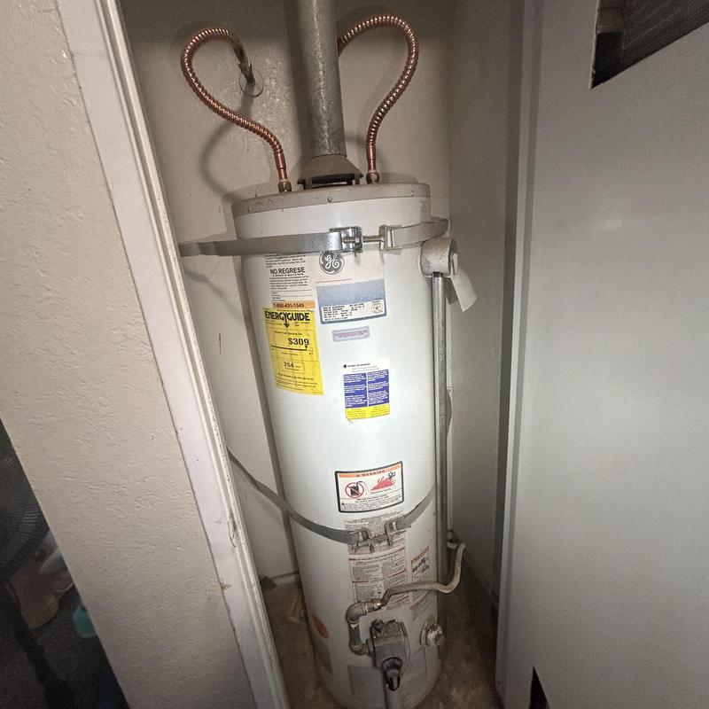 Water heater with new copper water and gas lines