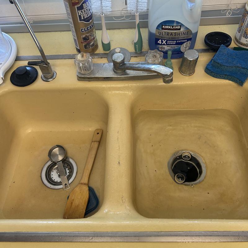 Kitchen sink with faucet and drain accessories