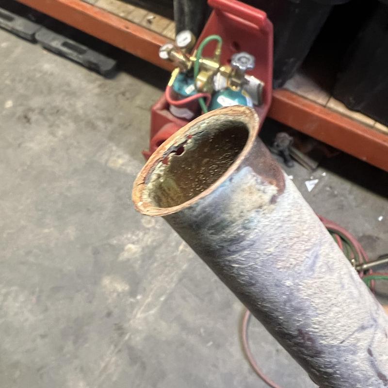 Irrigation pipe with corrosion damage cut end Irrigation pipe with corrosion damage cut end