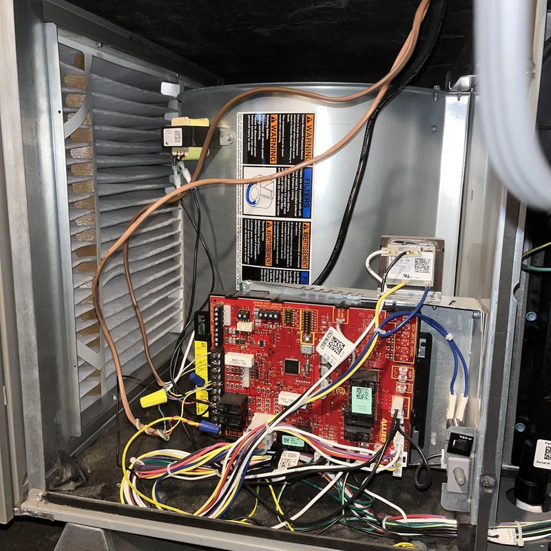 HVAC control board and wiring inside unit maintenance