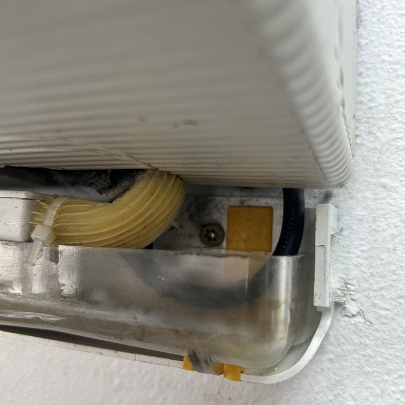Mini split AC conduit and tubing with zip tie Mini split AC conduit and tubing with zip tie