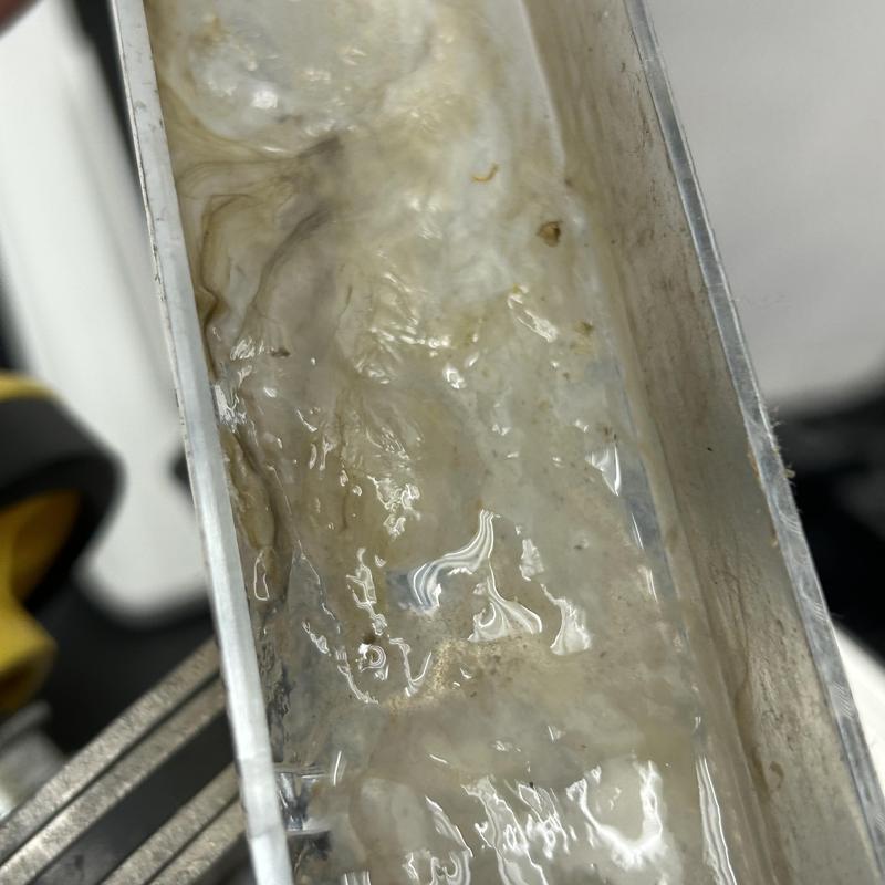 Mini split drain pan with standing water buildup Mini split drain pan with standing water buildup