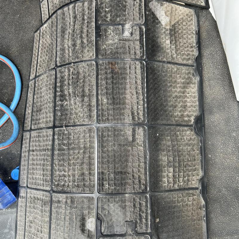 Mini split air filter clogged with dust and debris Mini split air filter clogged with dust and debris