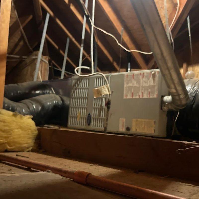 EL180UH furnace unit in attic with ductwork