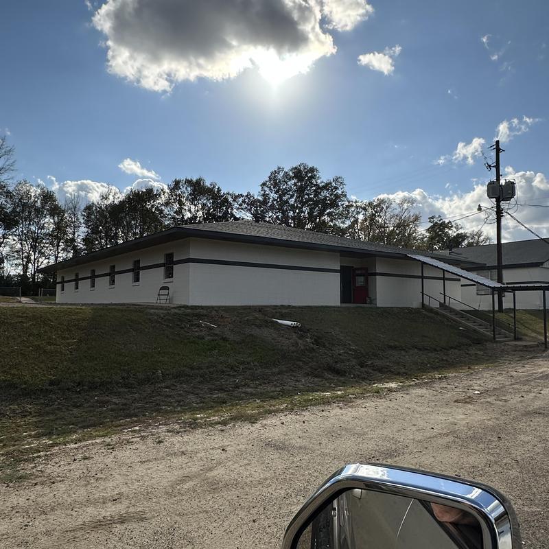 Exterior walls of Mercy House women's center with paint Exterior walls of Mercy House women's center with paint