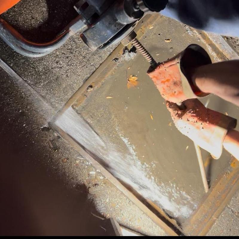 Storm drain cleaning with drain snake and water jet
