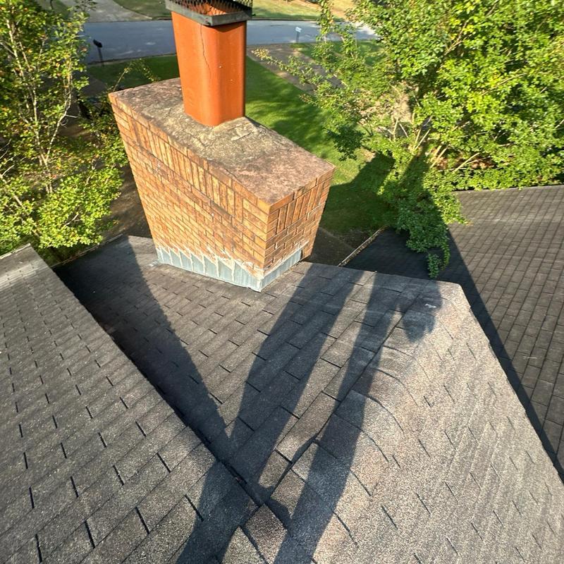 Brick chimney flashing and shingle roof inspection in Florence