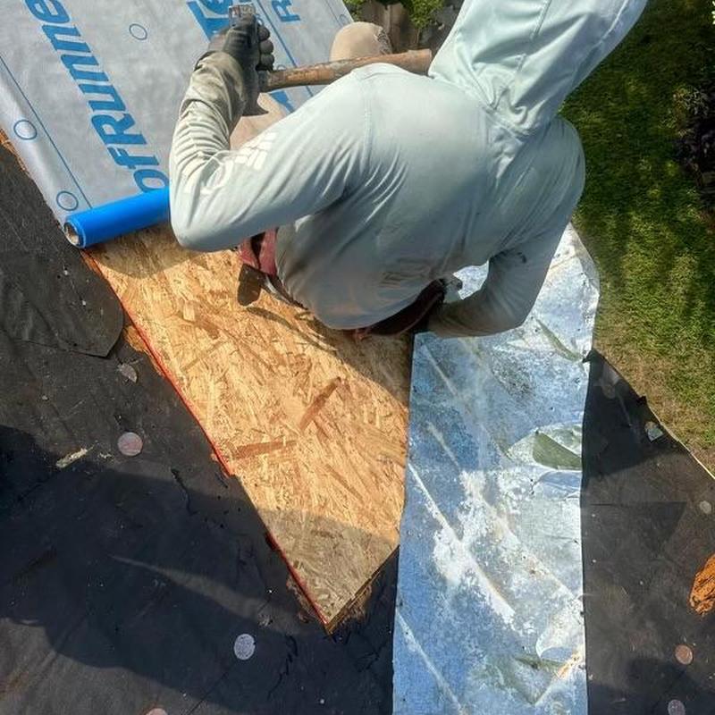 Roof decking and ice and water shield installation on roof