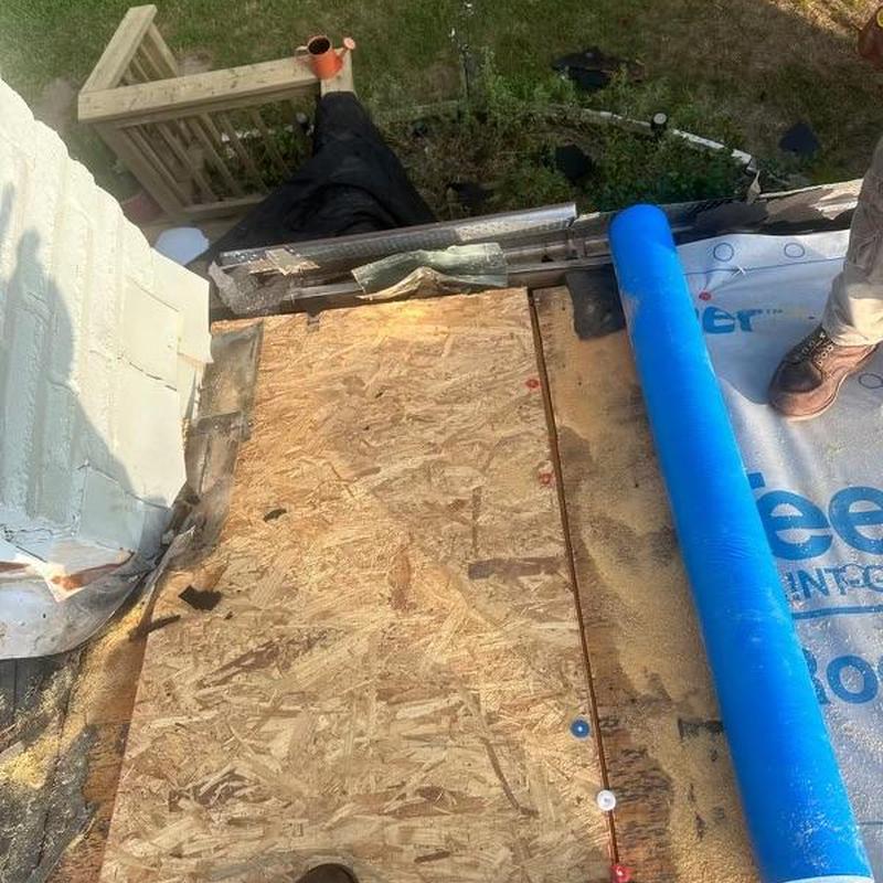 Roof decking replacement near chimney with underlayment