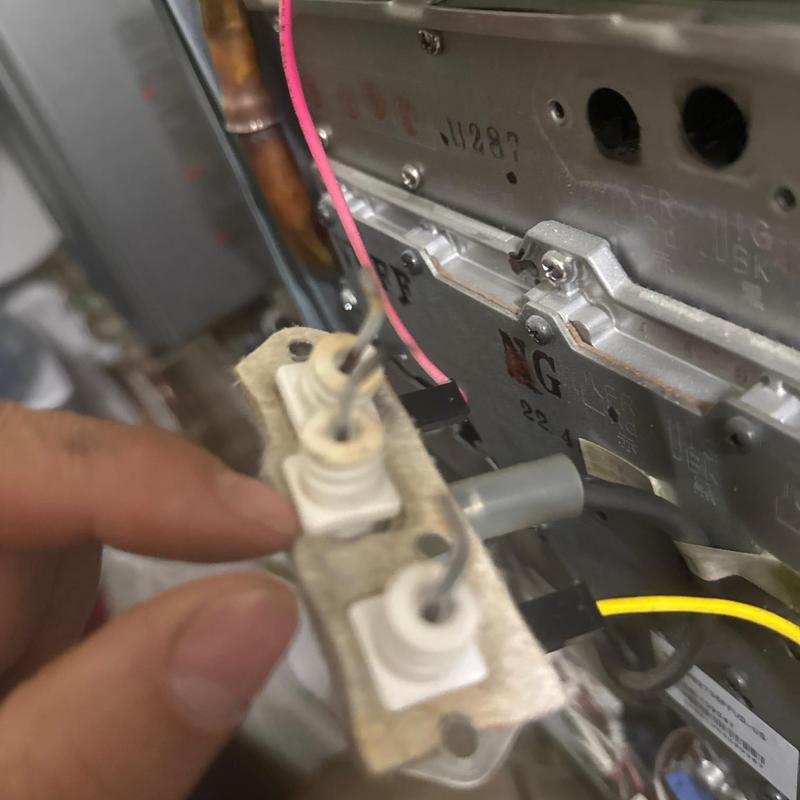 Tankless water heater flame rods cleaning and inspection