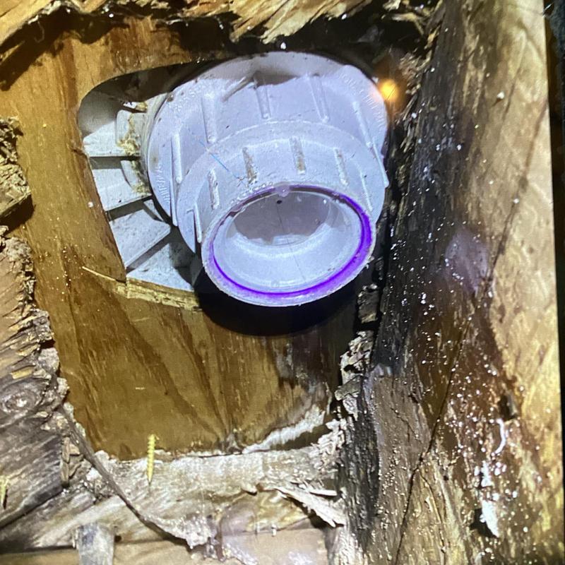 Shower drain pipe replacement with surrounding wood damage