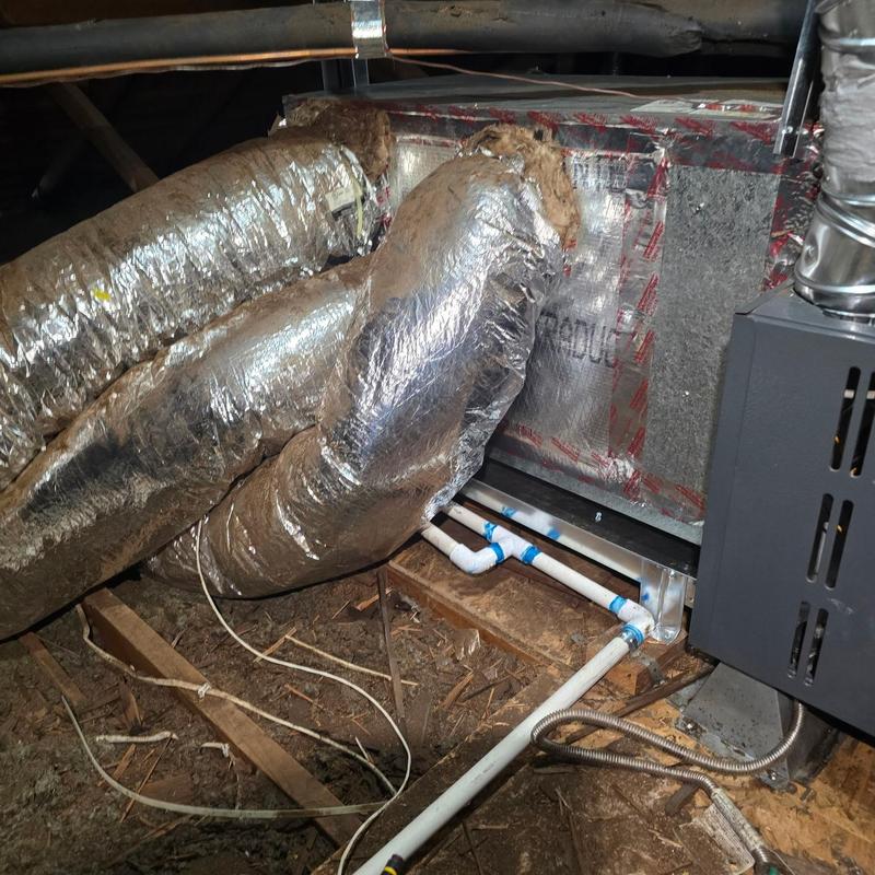 Blower motor and HVAC ductwork in attic space Blower motor and HVAC ductwork in attic space