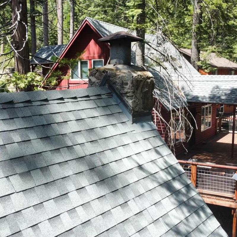 GAF lifetime asphalt roof on cabin chimney