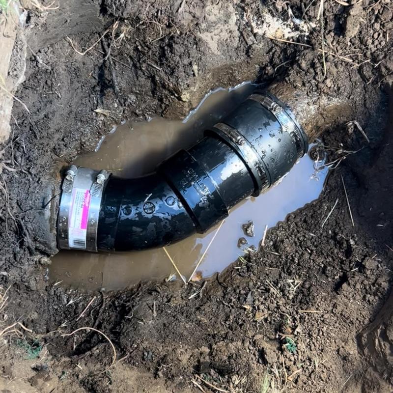 4-inch ABS sewer pipe replacement in muddy ground