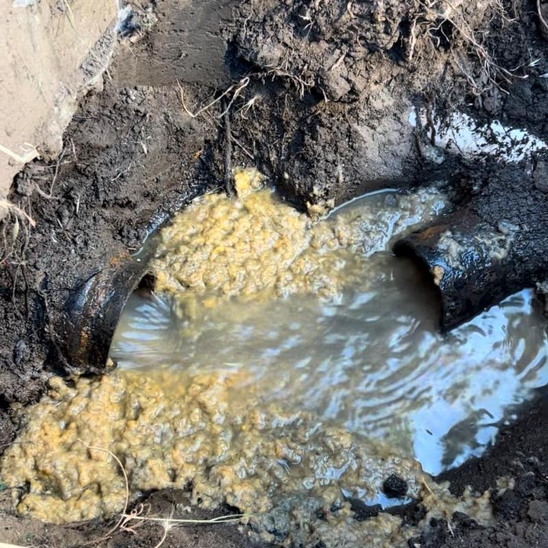 4-inch sewer pipe collapse with water leak outdoors