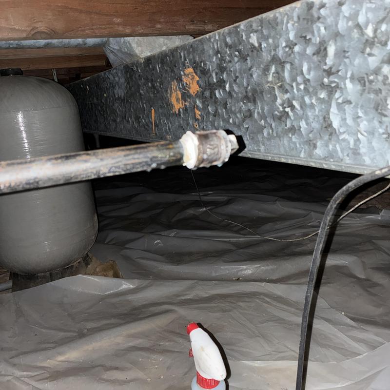 Unused capped gas pipe in crawl space