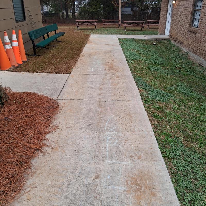Concrete sidewalk pressure washed after sod installation Concrete sidewalk pressure washed after sod installation