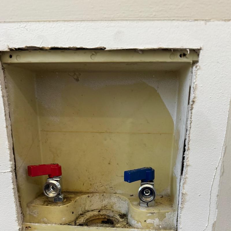 Washer valve box with new quarter turn valves installed