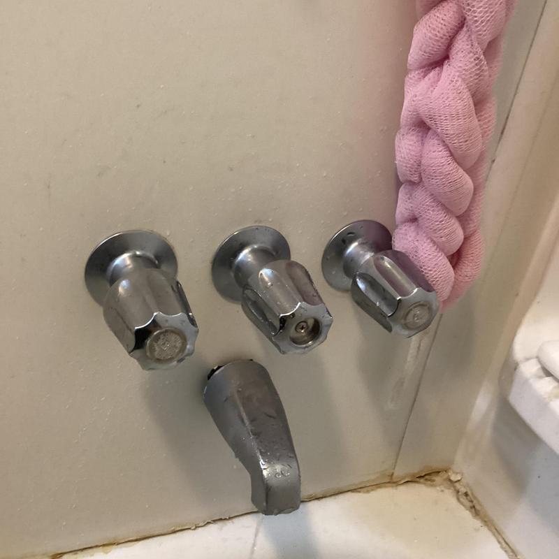 Tub and shower faucet handles with diverter downspout
