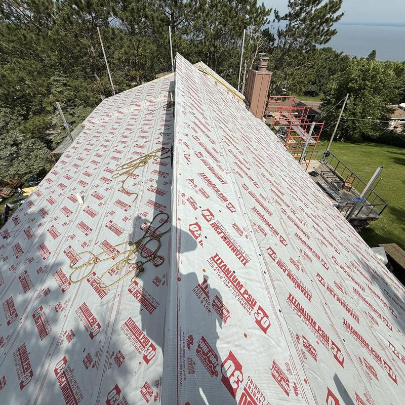 Titanium PSU30 roofing underlayment installation on steep roof