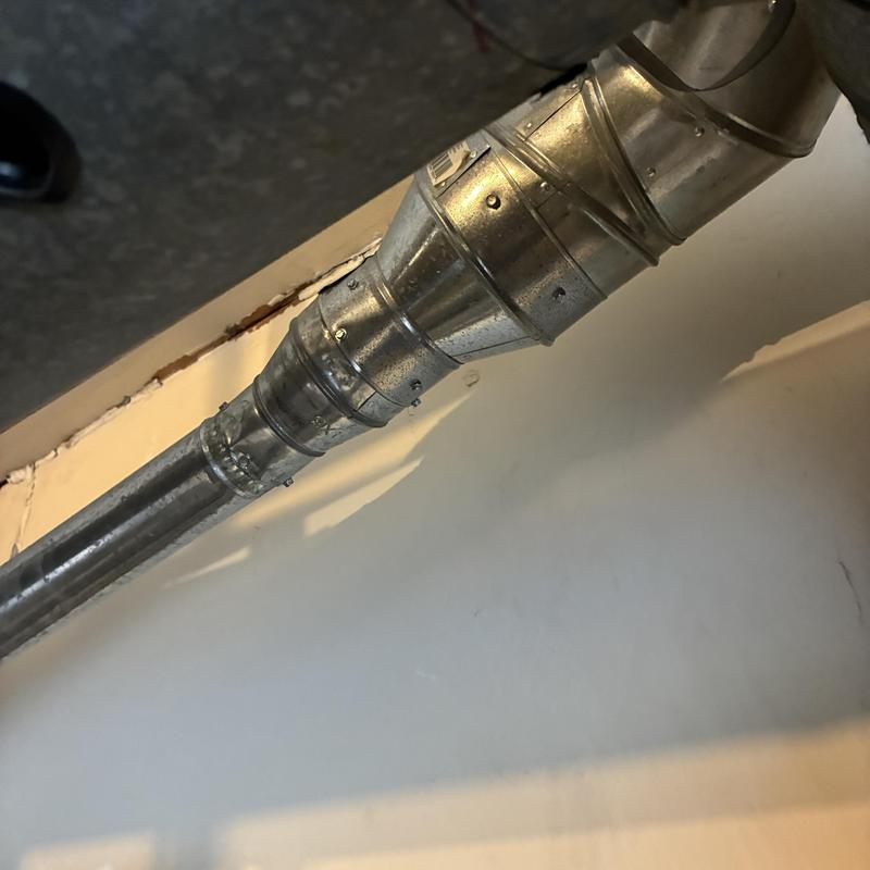 Water heater flue pipe with repaired seams