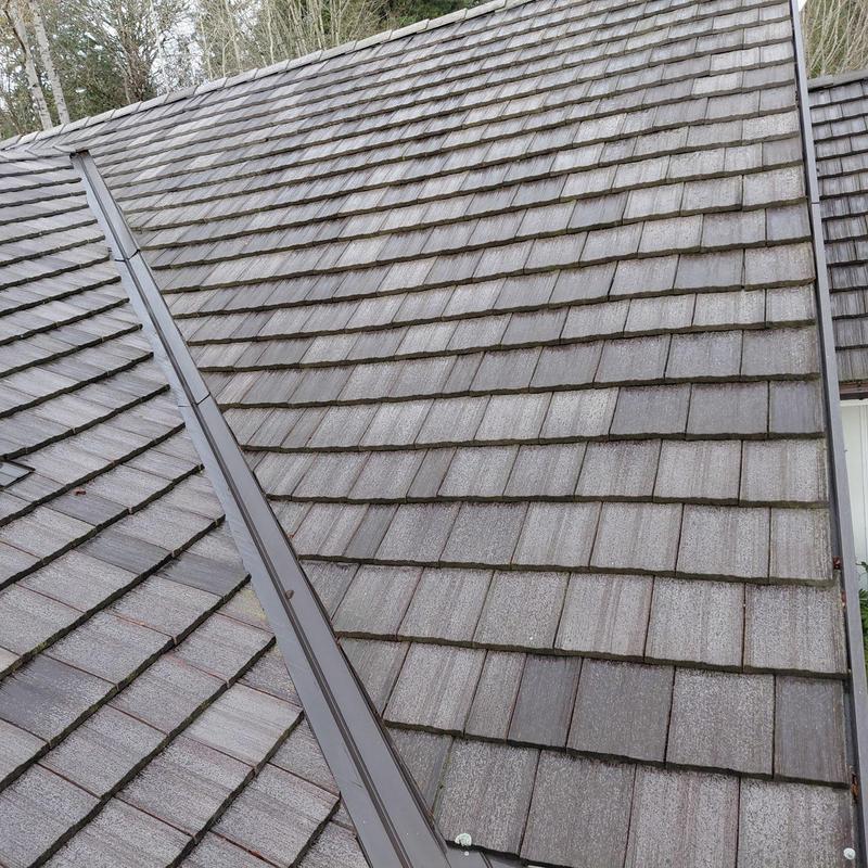 Roof shingles with metal valley flashing cleaning and moss treatment