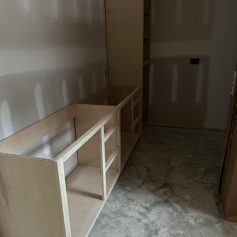 Vanity cabinet frame installation in unfinished bathroom Vanity cabinet frame installation in unfinished bathroom