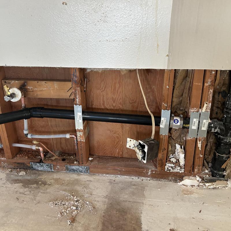 Kitchen drain line and water supply plumbing modifications