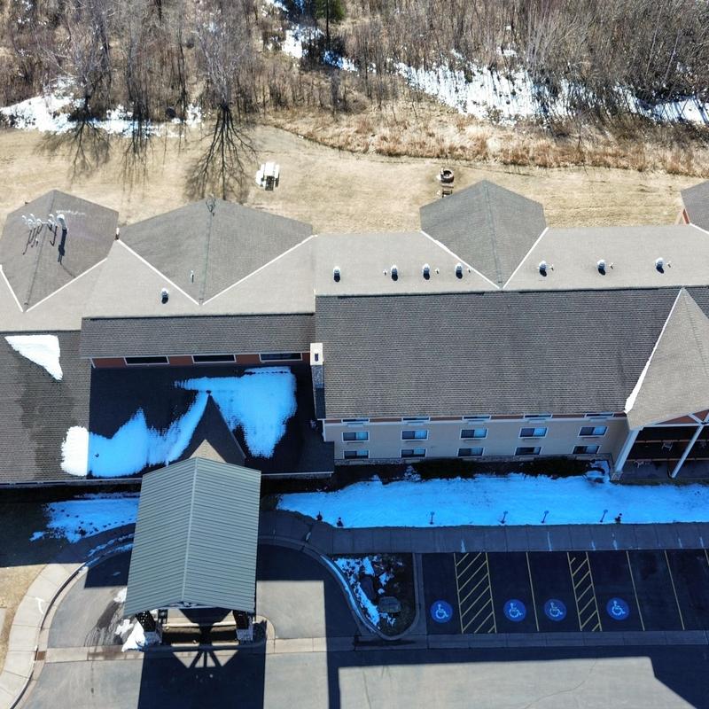 CertainTeed Landmark roof shingles on lakeside residence CertainTeed Landmark roof shingles on lakeside residence