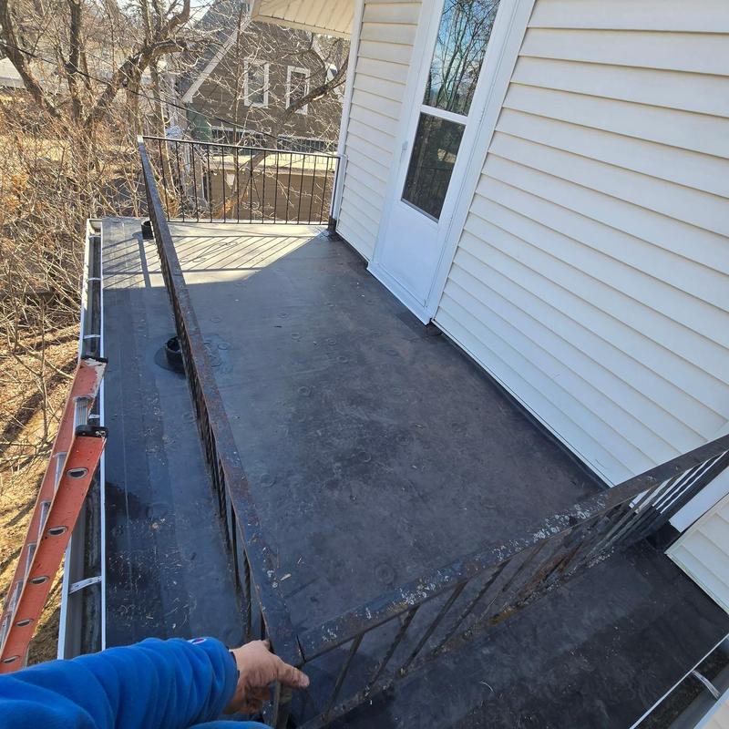 GenFlex single-ply membrane roof on upper balcony GenFlex single-ply membrane roof on upper balcony