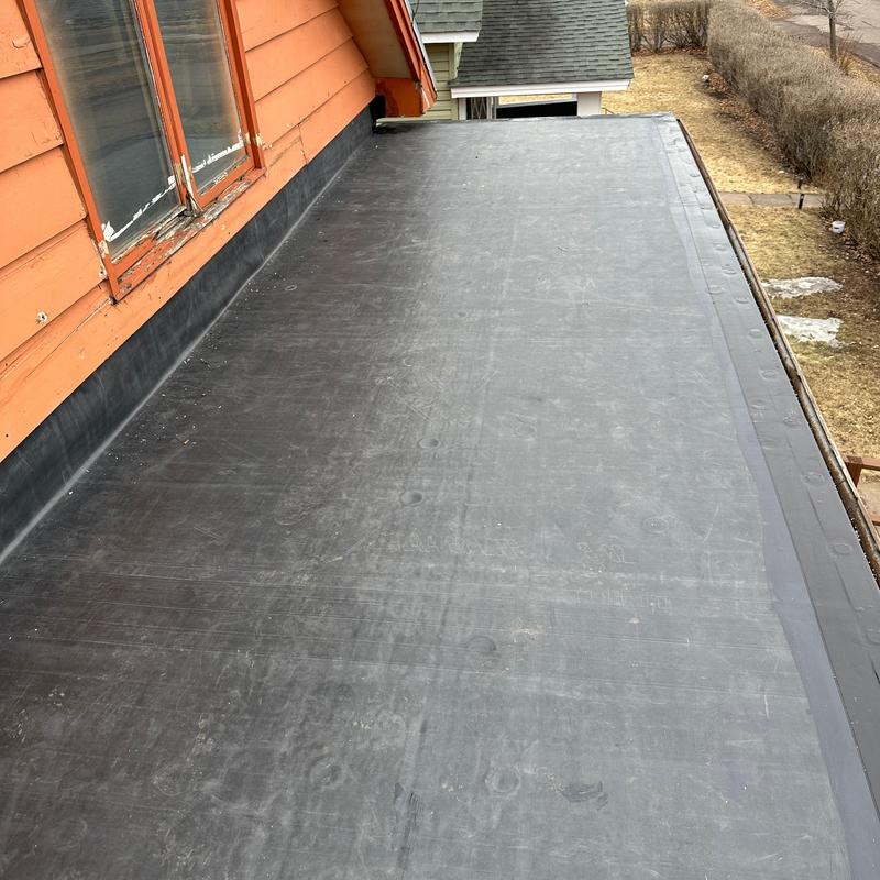 GenFlex EPDM flat roof membrane installed on porch roof GenFlex EPDM flat roof membrane installed on porch roof