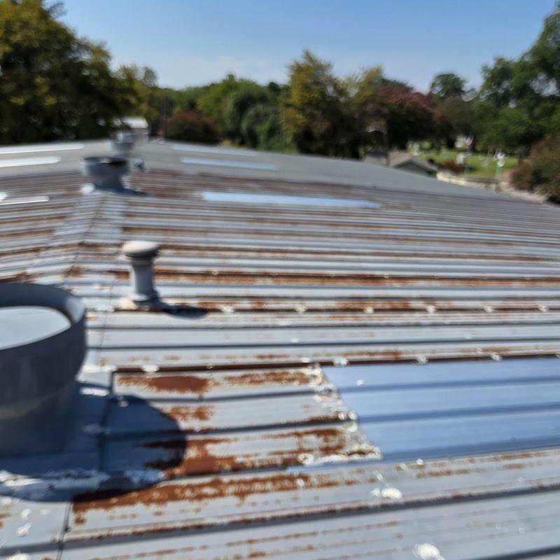 Metal roof with rust and hail damage in Terrell, TX Metal roof with rust and hail damage in Terrell, TX