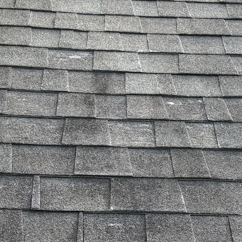 GAF Timberline HDZ asphalt roof shingles close-up damage