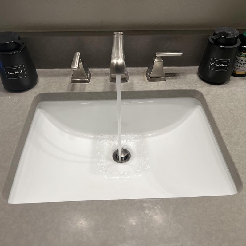 Bathroom sink faucet with running water