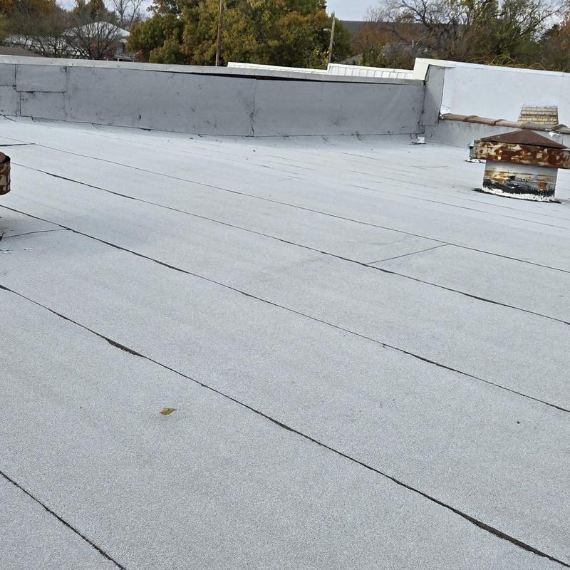 Flat roof with hail damage in Terrell, TX