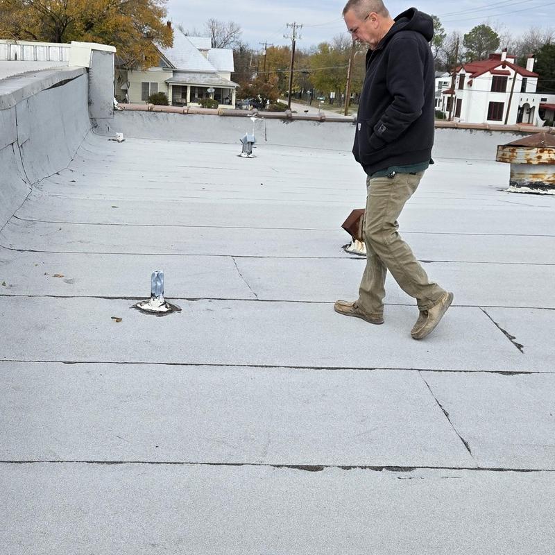 Flat roof surface inspection after hail in Terrell TX