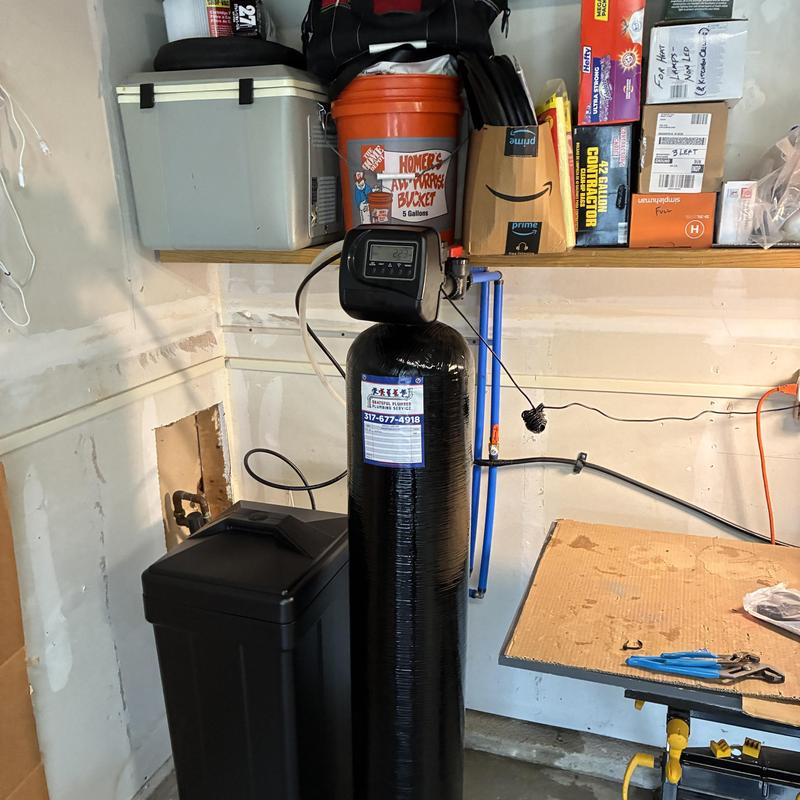 48k grain water softener installation in utility room
