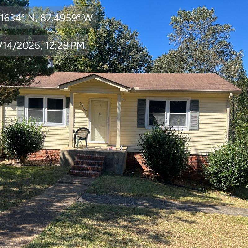 Asphalt shingle roof on residential home in daylight Asphalt shingle roof on residential home in daylight