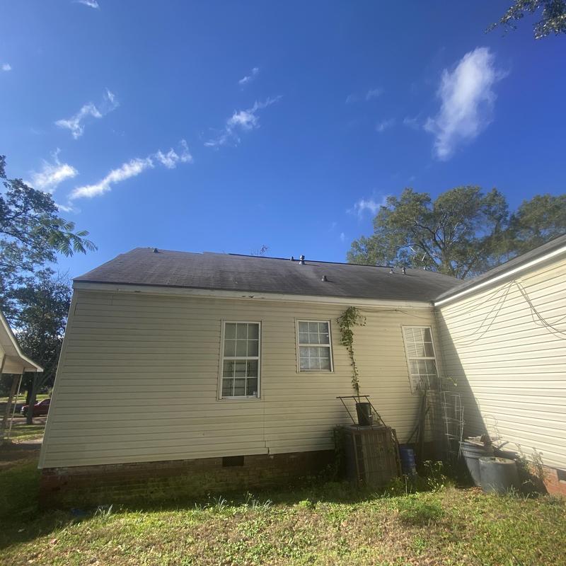 Composite shingle roof with intact structure and siding Composite shingle roof with intact structure and siding