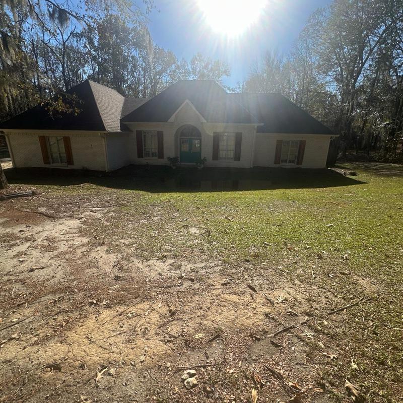 Residential roof with sunlight during inspection in Florence