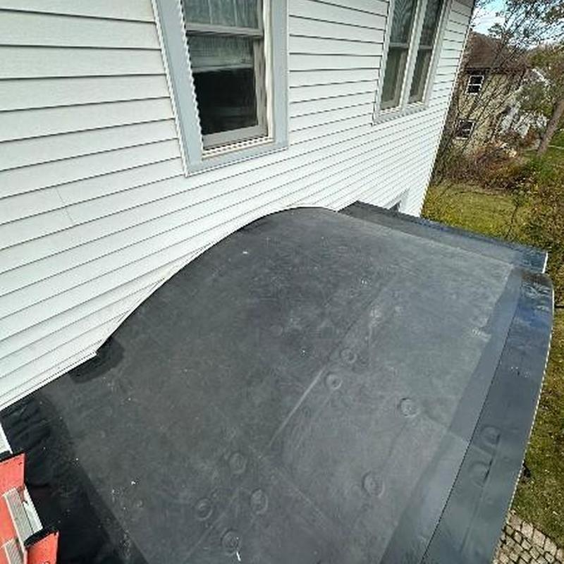 GenFlex EPDM rubber roofing on curved entry roof GenFlex EPDM rubber roofing on curved entry roof