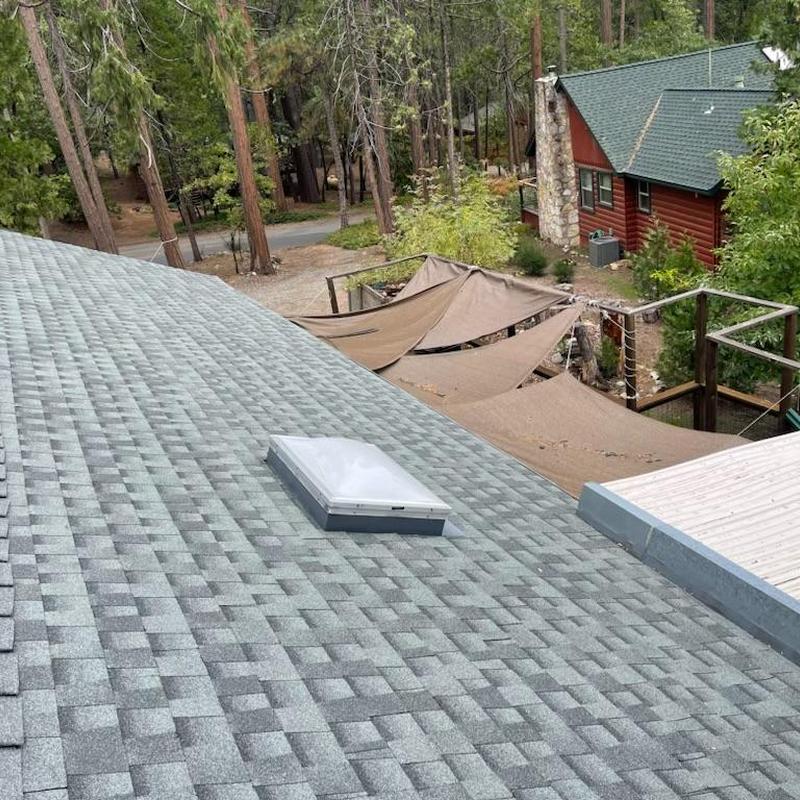 GAF asphalt shingle roof with skylight installation