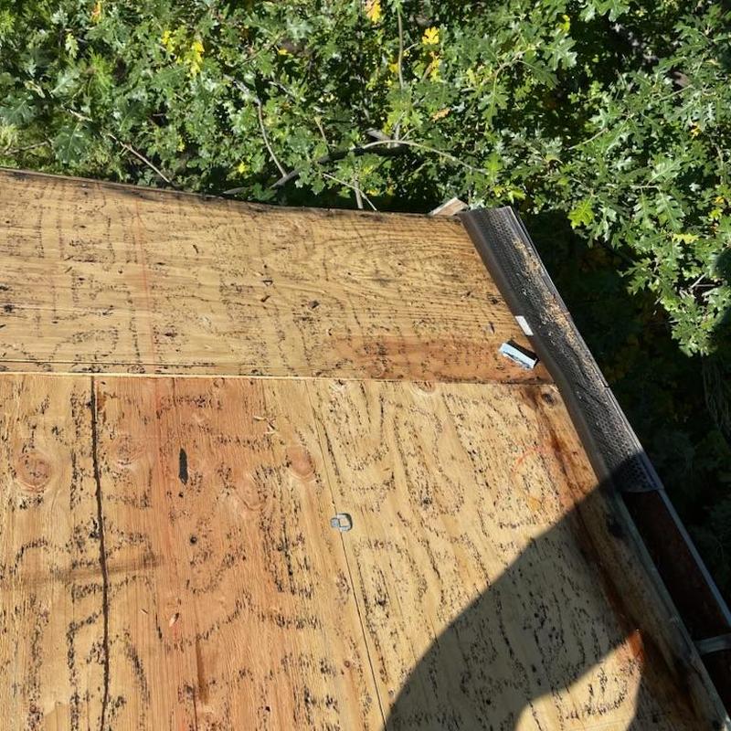 Plywood roof decking with installed drip edge