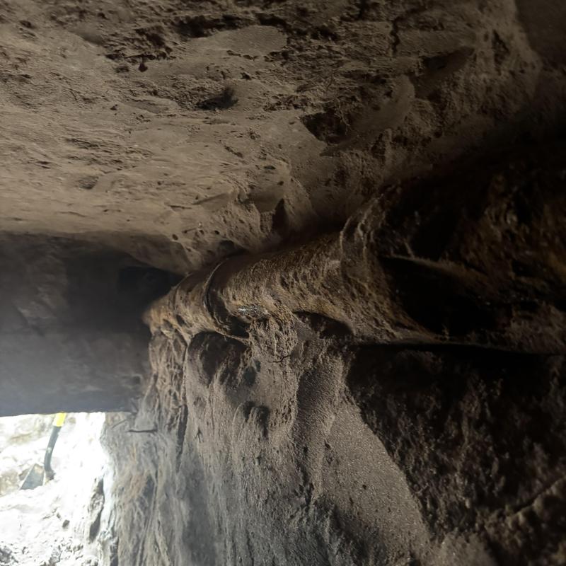 Cast iron pipe tunnel trenching under home