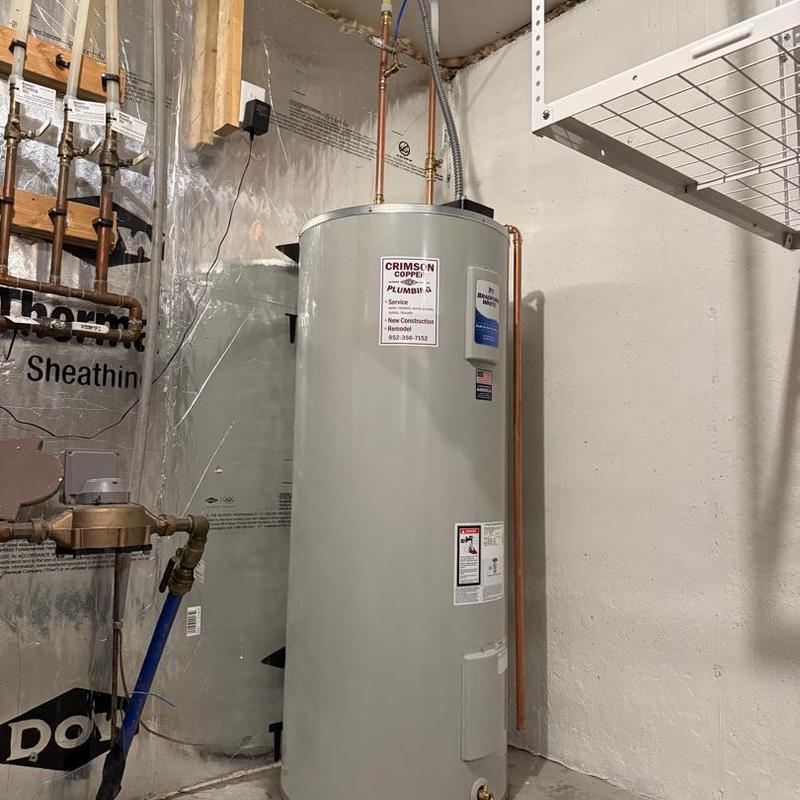 Electric water heater with new copper pipes installed