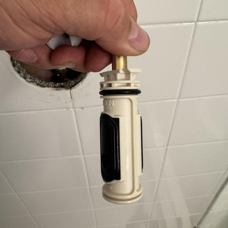 Moen shower cartridge removed from wall fixture