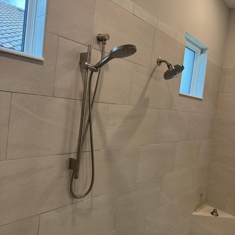 Shower heads and handheld bar with tiled wall installation