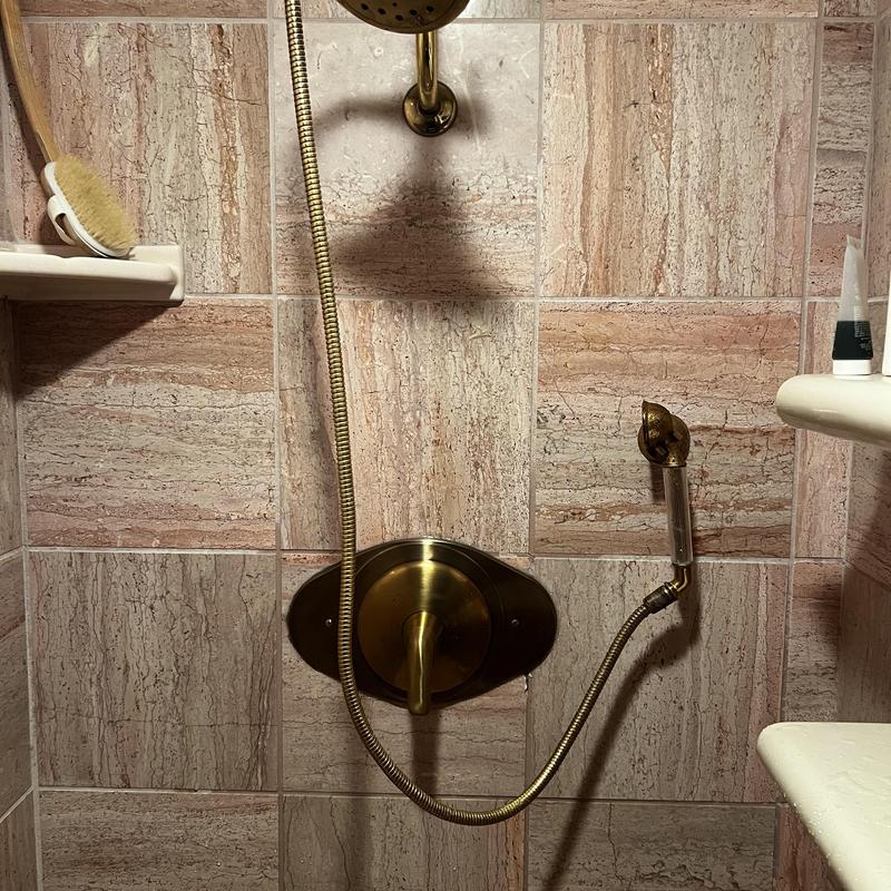 Shower valve with detached handheld showerhead