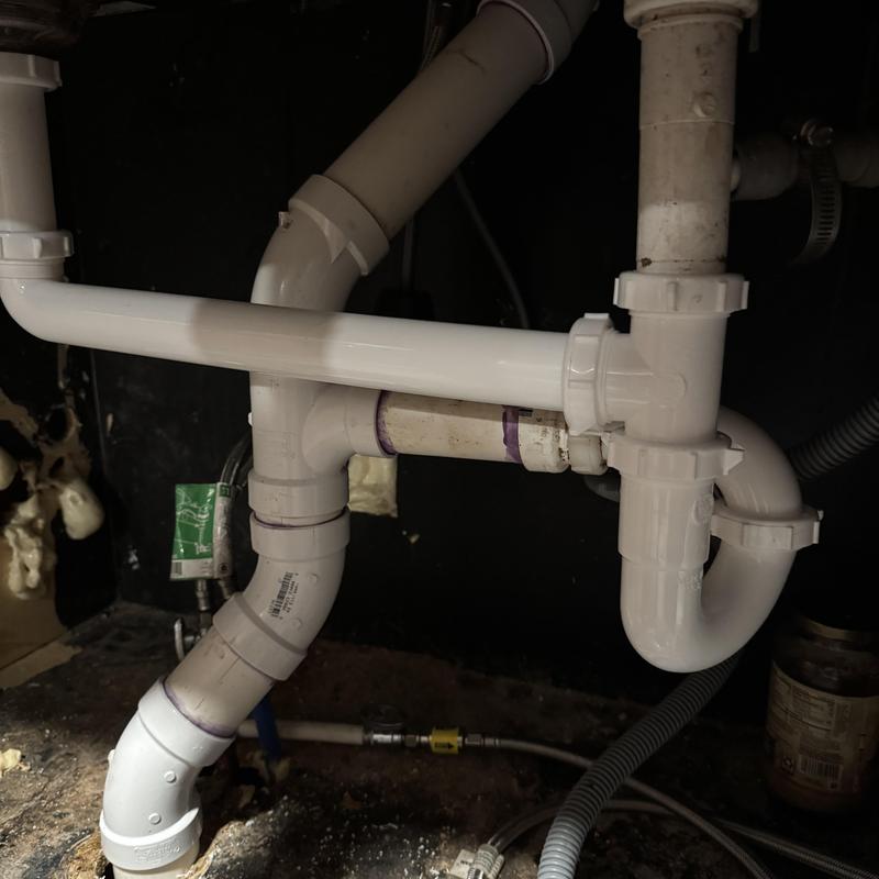 PVC drain pipes in crawl space installation