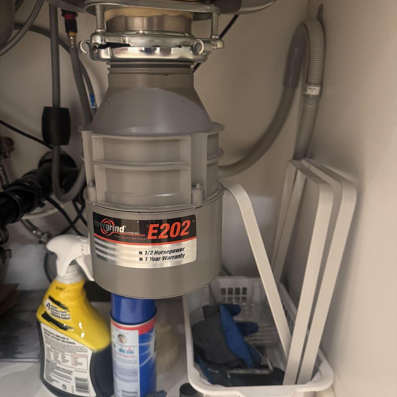 Garbage disposal unit Evergrind E202 under sink